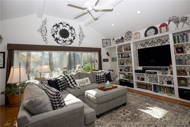 Perfectly positioned on a dog-leg right par five of the Seven on Seven Lakes Country Club in North Carolina - for sale on GolfHomes.com, golf home, golf lot