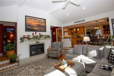 Perfectly positioned on a dog-leg right par five of the Seven on Seven Lakes Country Club in North Carolina - for sale on GolfHomes.com, golf home, golf lot