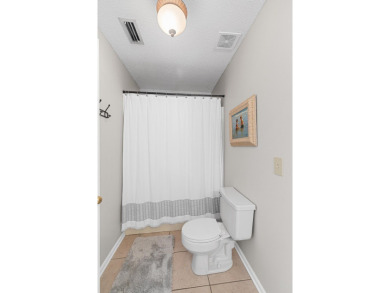 Welcome to this charming tri-level home located in the Olympia on Dothan National Golf Club and Hotel in Alabama - for sale on GolfHomes.com, golf home, golf lot