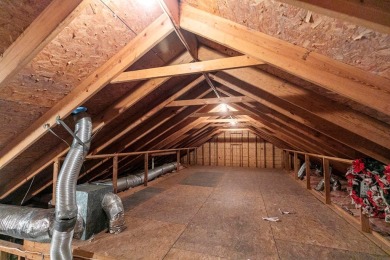 Welcome to this charming tri-level home located in the Olympia on Dothan National Golf Club and Hotel in Alabama - for sale on GolfHomes.com, golf home, golf lot