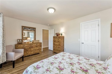 Like-new and truly move-in ready, this stunning 2-story on Oakwoods Country Club in North Carolina - for sale on GolfHomes.com, golf home, golf lot