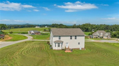 Like-new and truly move-in ready, this stunning 2-story on Oakwoods Country Club in North Carolina - for sale on GolfHomes.com, golf home, golf lot