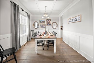 Experience luxury, comfort, and exceptional functionality in on Anderson Creek Golf Club in North Carolina - for sale on GolfHomes.com, golf home, golf lot