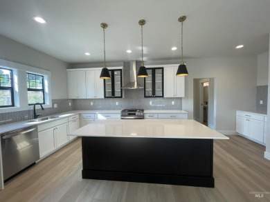 Low-maintenance luxury living just steps from downtown Eagle on Eagle Hills Golf Course in Idaho - for sale on GolfHomes.com, golf home, golf lot