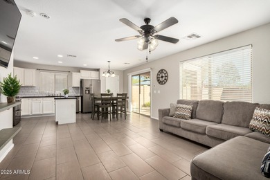 WELCOME HOME! This 4 BR/2.5 BA newly painted two-story home on Poston Butte Golf Club in Arizona - for sale on GolfHomes.com, golf home, golf lot