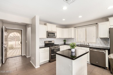 WELCOME HOME! This 4 BR/2.5 BA newly painted two-story home on Poston Butte Golf Club in Arizona - for sale on GolfHomes.com, golf home, golf lot