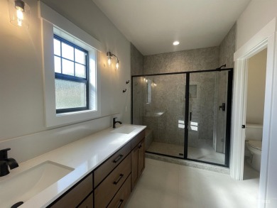Low-maintenance luxury living just steps from downtown Eagle on Eagle Hills Golf Course in Idaho - for sale on GolfHomes.com, golf home, golf lot