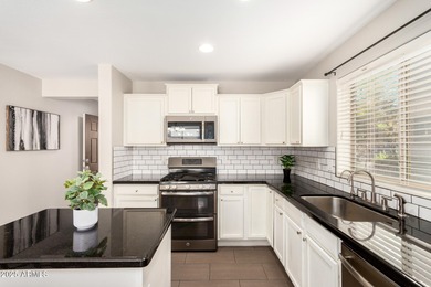 WELCOME HOME! This 4 BR/2.5 BA newly painted two-story home on Poston Butte Golf Club in Arizona - for sale on GolfHomes.com, golf home, golf lot