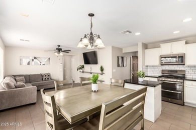 WELCOME HOME! This 4 BR/2.5 BA newly painted two-story home on Poston Butte Golf Club in Arizona - for sale on GolfHomes.com, golf home, golf lot