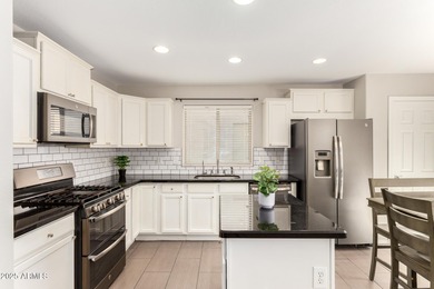 WELCOME HOME! This 4 BR/2.5 BA newly painted two-story home on Poston Butte Golf Club in Arizona - for sale on GolfHomes.com, golf home, golf lot