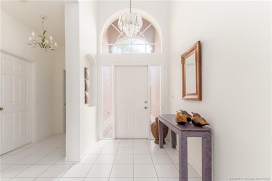 NEW to Market, this Ballantrae home with 3 bedrooms, 2 bathrooms on Santa Lucia River Club in Florida - for sale on GolfHomes.com, golf home, golf lot