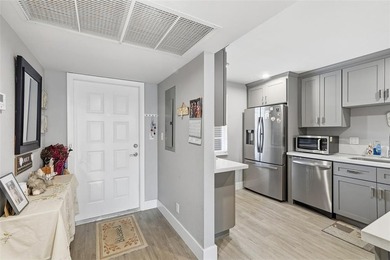 Beautifully updated third-floor condo in desirable Palm-Aire on Oaks Country Club in Florida - for sale on GolfHomes.com, golf home, golf lot