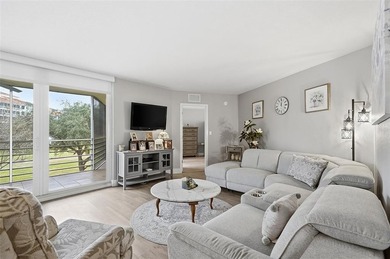 Beautifully updated third-floor condo in desirable Palm-Aire on Oaks Country Club in Florida - for sale on GolfHomes.com, golf home, golf lot