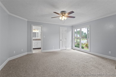 Premier Architecture and updates throughout this 3,500+ square on Gates Four Golf and Country Club in North Carolina - for sale on GolfHomes.com, golf home, golf lot