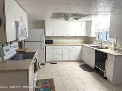 Welcome to this beautifully furnished 2-bedroom, 2-bathroom home on High Point Golf Club, Inc. in Florida - for sale on GolfHomes.com, golf home, golf lot