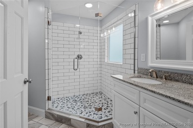 Premier Architecture and updates throughout this 3,500+ square on Gates Four Golf and Country Club in North Carolina - for sale on GolfHomes.com, golf home, golf lot