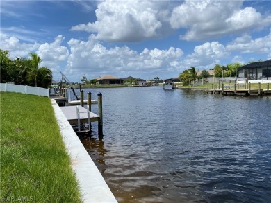 Seawall and dock on place, clean and ready to build. Fast Golf on Burnt Store Golf Club in Florida - for sale on GolfHomes.com, golf home, golf lot