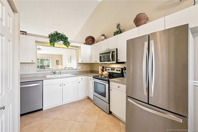 GOLF COURSE VIEWS & NEW METAL ROOF - TURNKEY OPPORTUNITY! on Eagle Marsh Golf Club in Florida - for sale on GolfHomes.com, golf home, golf lot