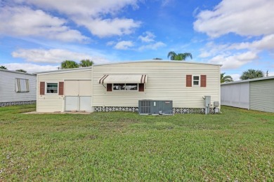 So adorable you'll feel right at home. Move in ready, tastefully on Maple Leaf Golf and Country Club in Florida - for sale on GolfHomes.com, golf home, golf lot