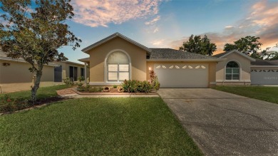 Enjoy peaceful golf course and water views from this 2-bedroom on Imperial Lakes Country Club in Florida - for sale on GolfHomes.com, golf home, golf lot