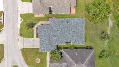 Enjoy peaceful golf course and water views from this 2-bedroom on Imperial Lakes Country Club in Florida - for sale on GolfHomes.com, golf home, golf lot