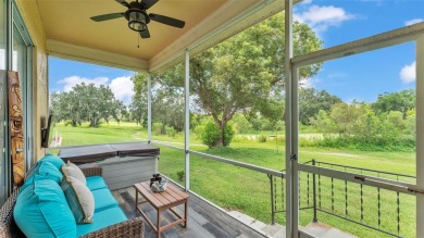Enjoy peaceful golf course and water views from this 2-bedroom on Imperial Lakes Country Club in Florida - for sale on GolfHomes.com, golf home, golf lot