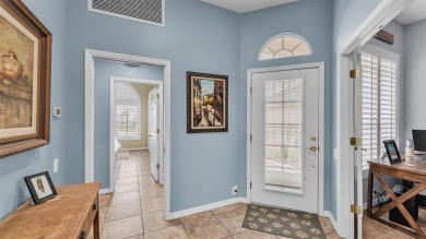 Enjoy peaceful golf course and water views from this 2-bedroom on Imperial Lakes Country Club in Florida - for sale on GolfHomes.com, golf home, golf lot