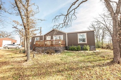 Beautiful home located on a quiet street at the back of a on Nocona Hills Golf Course in Texas - for sale on GolfHomes.com, golf home, golf lot