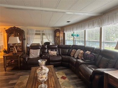 Welcome to a sought-after 55+ golf course community! This on Zellwood Station Country Club in Florida - for sale on GolfHomes.com, golf home, golf lot