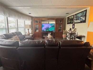 Welcome to a sought-after 55+ golf course community! This on Zellwood Station Country Club in Florida - for sale on GolfHomes.com, golf home, golf lot