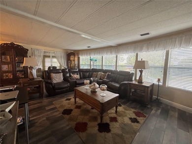 Welcome to a sought-after 55+ golf course community! This on Zellwood Station Country Club in Florida - for sale on GolfHomes.com, golf home, golf lot