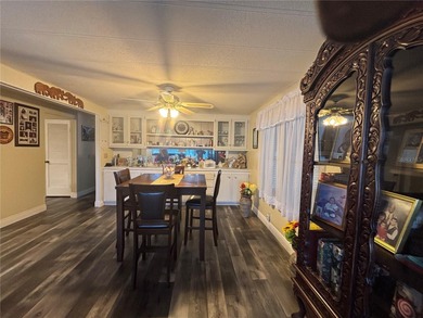 Welcome to a sought-after 55+ golf course community! This on Zellwood Station Country Club in Florida - for sale on GolfHomes.com, golf home, golf lot