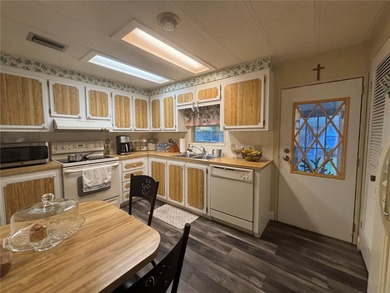 Welcome to a sought-after 55+ golf course community! This on Zellwood Station Country Club in Florida - for sale on GolfHomes.com, golf home, golf lot