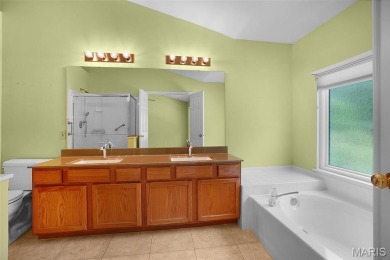 The curb appeal of this spacious O'Fallon ranch home is on The Falls Golf Club in Missouri - for sale on GolfHomes.com, golf home, golf lot