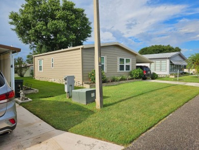 This meticulously maintained 1983 Barr 2bd 2ba home has been on Grasslands Golf and Country Club in Florida - for sale on GolfHomes.com, golf home, golf lot