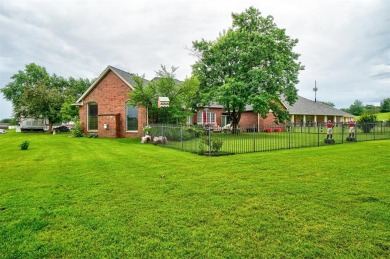 Welcome to this breathtaking 4-bedroom, 3-bathroom home located on Shawnee Country Club in Oklahoma - for sale on GolfHomes.com, golf home, golf lot