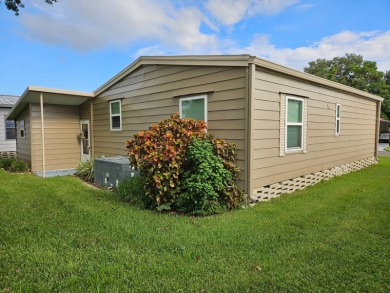 This meticulously maintained 1983 Barr 2bd 2ba home has been on Grasslands Golf and Country Club in Florida - for sale on GolfHomes.com, golf home, golf lot