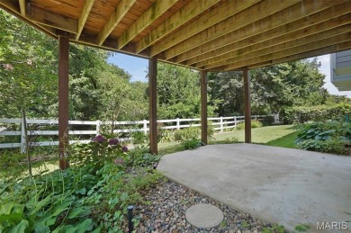 The curb appeal of this spacious O'Fallon ranch home is on The Falls Golf Club in Missouri - for sale on GolfHomes.com, golf home, golf lot
