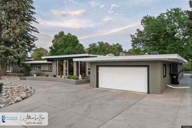 Step into complete paradise with this contemporary ranch style on Paradise Valley Country Club in Wyoming - for sale on GolfHomes.com, golf home, golf lot