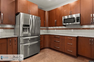 Step into complete paradise with this contemporary ranch style on Paradise Valley Country Club in Wyoming - for sale on GolfHomes.com, golf home, golf lot