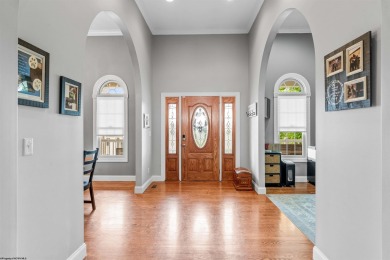 This is a beautiful custom home with massive archways, vaulted on Mountaineer Golf and Country Club in West Virginia - for sale on GolfHomes.com, golf home, golf lot