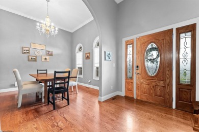 This is a beautiful custom home with massive archways, vaulted on Mountaineer Golf and Country Club in West Virginia - for sale on GolfHomes.com, golf home, golf lot