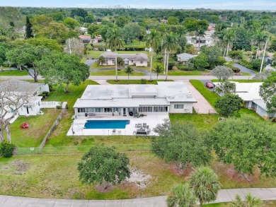 Plantation Golf Estates home sits directly on the golf course w/ on Plantation Preserve Golf Course in Florida - for sale on GolfHomes.com, golf home, golf lot