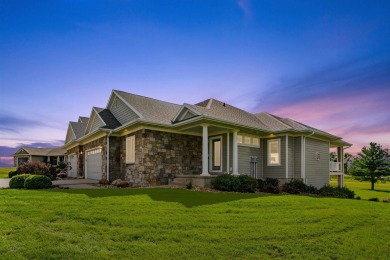 Situated on hole #4 at River Ridge Golf Course, this stunning on River Ridge Golf Club in Iowa - for sale on GolfHomes.com, golf home, golf lot