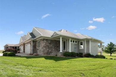 Situated on hole #4 at River Ridge Golf Course, this stunning on River Ridge Golf Club in Iowa - for sale on GolfHomes.com, golf home, golf lot
