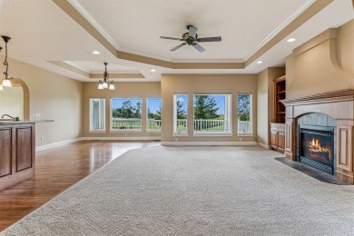 Situated on hole #4 at River Ridge Golf Course, this stunning on River Ridge Golf Club in Iowa - for sale on GolfHomes.com, golf home, golf lot