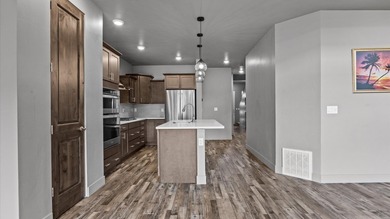 Luxury townhome just steps away from the award winning Redlands on The Golf Club At Redlands Mesa in Colorado - for sale on GolfHomes.com, golf home, golf lot