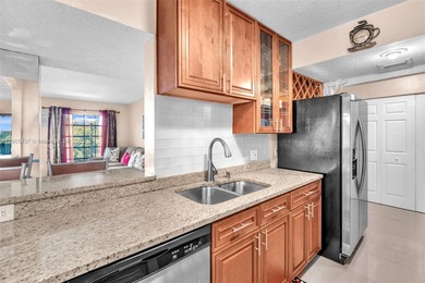 Spacious 3-bedroom, 2-bath corner unit located on the top floor on Woodlands Country Club in Florida - for sale on GolfHomes.com, golf home, golf lot