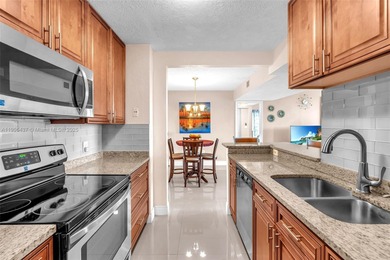 Spacious 3-bedroom, 2-bath corner unit located on the top floor on Woodlands Country Club in Florida - for sale on GolfHomes.com, golf home, golf lot