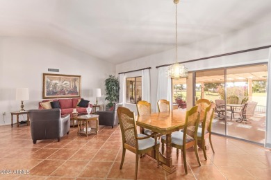 Step into this spacious, sun-soaked 3-bedroom, 2-bath San Simeon on Stardust Golf Course in Arizona - for sale on GolfHomes.com, golf home, golf lot